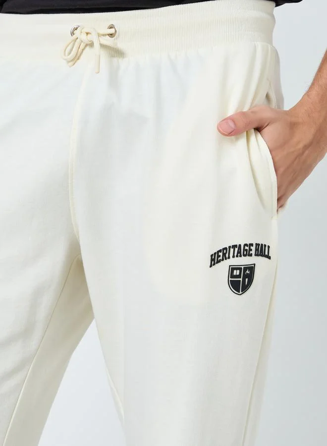 Styli Men Cream Pocket Print Terry Joggers